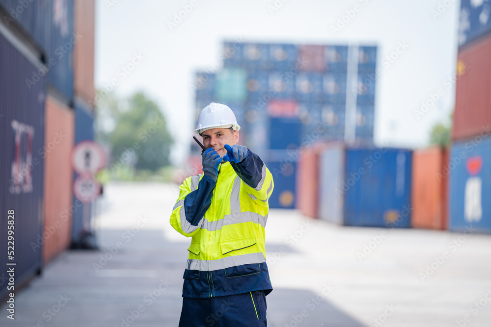 Foreman checking Containers box with shipping containers before departure for export business logist