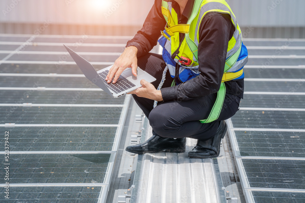 Technicians are checking solar panel,Engineer service check installation solar cell on the roof of f