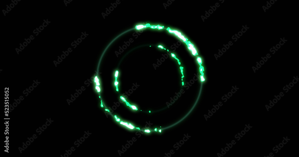 Image of glowing green circles over black background