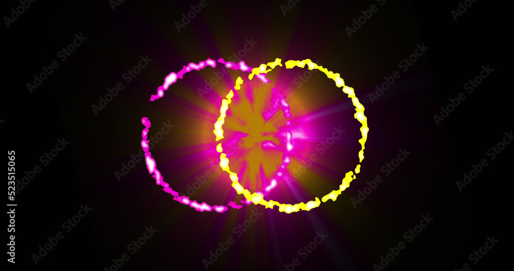 Image of glowing yellow and pink circles over black background