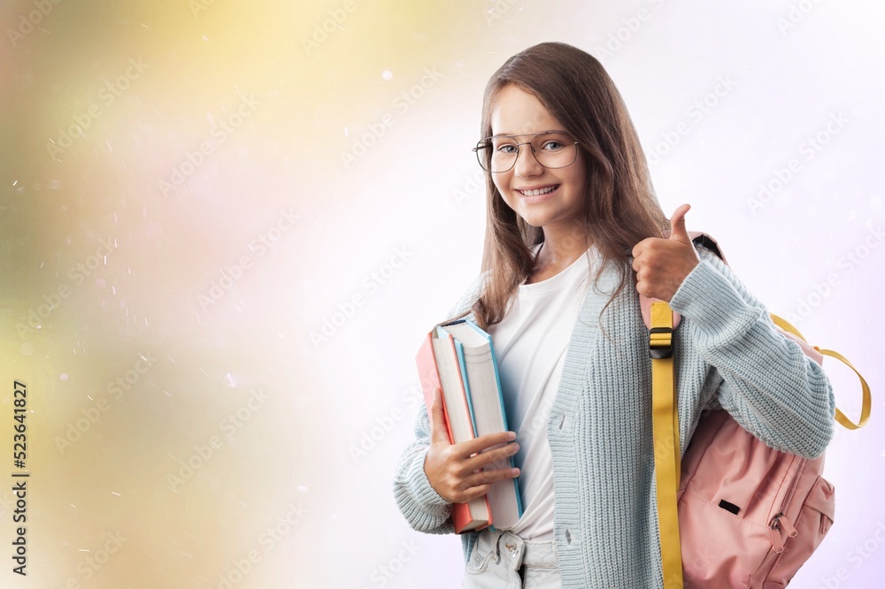 Smiling young girl student. Education in high school university college concept.