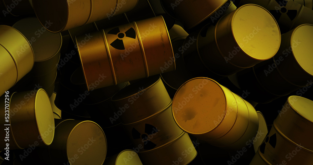 Image of multiple yellow barrels with black nuclear symbols