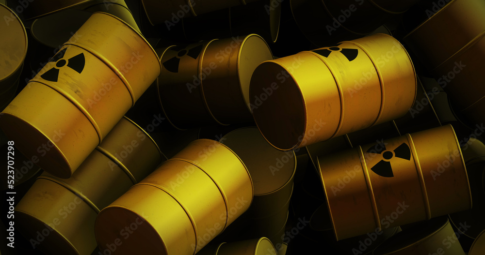 Image of multiple yellow barrels with black nuclear symbols