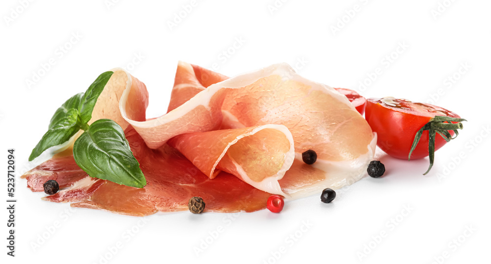 Delicious sliced jamon with spices on white background