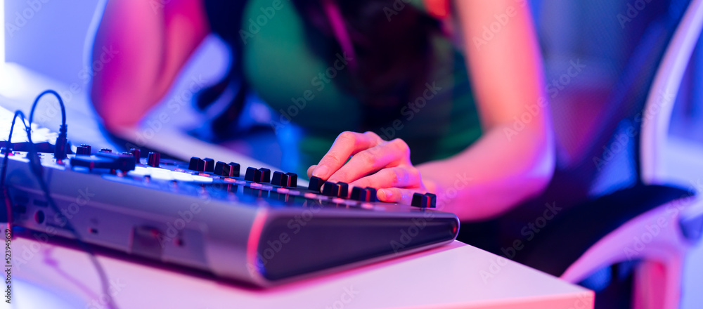 Close up of audio DJ woman speaks into microphone to broadcasting.