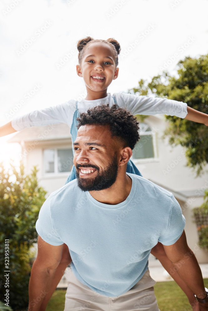 Piggyback, playful and young father with his child bonding outdoors in the garden at home. Happy mal