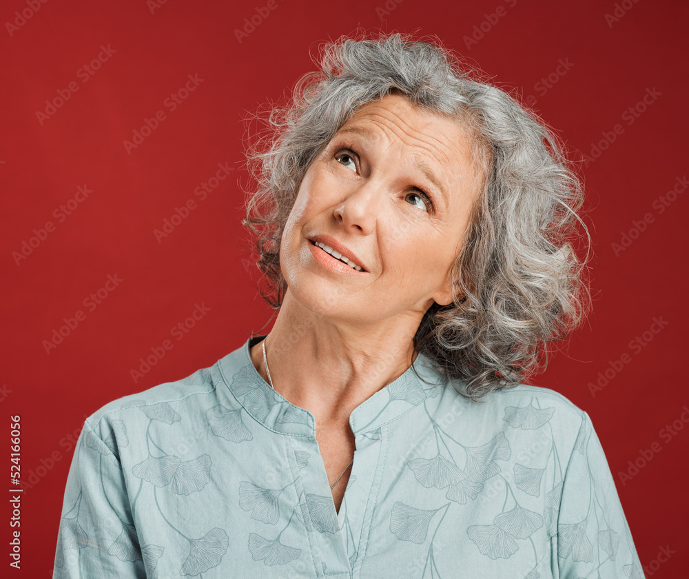 Thinking and looking up older mature lady or grandmother deciding the best early retirement or old a