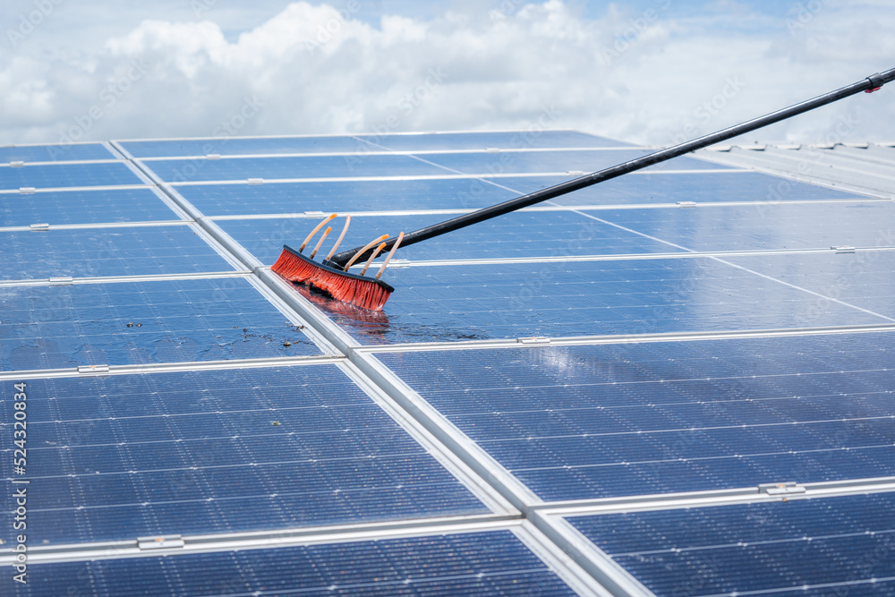 labor working on cleaning solar panel at solar power plant,Professional cleaning,Solar panels.