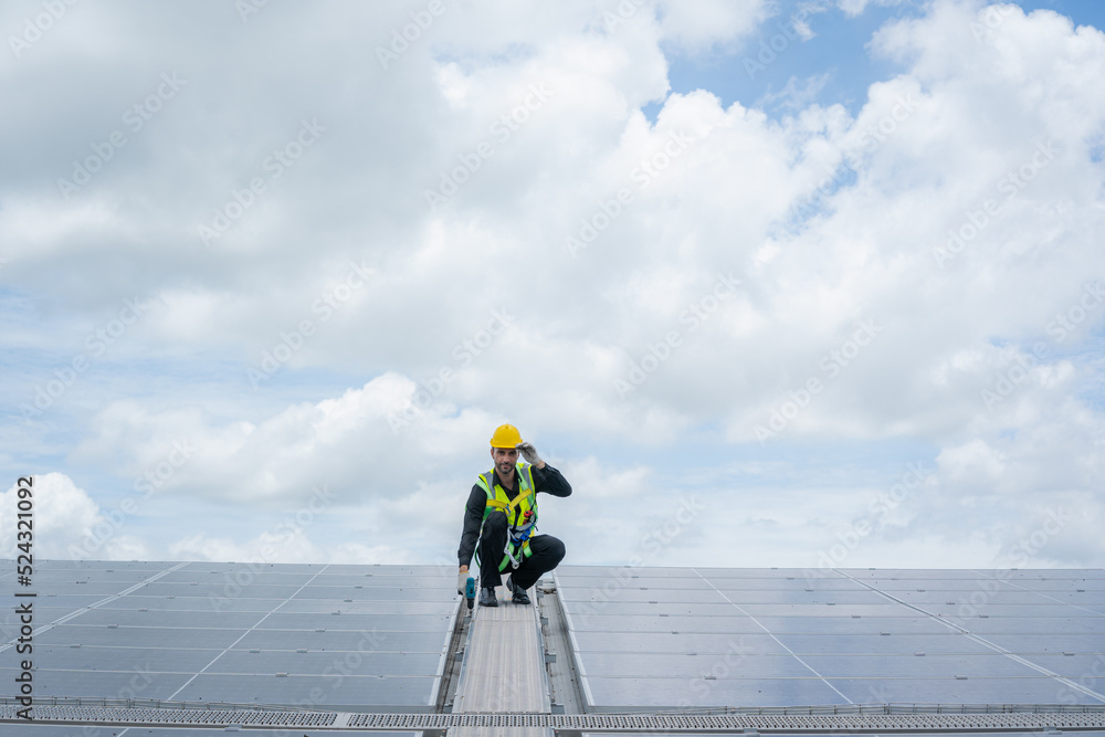 Technician checking Solar panel on top roof,Sun energy,Solar panel, Alternative electricity source,C