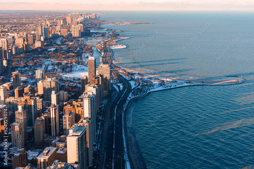 Cityscape aerial view of Chicago from observation deck at sunset.