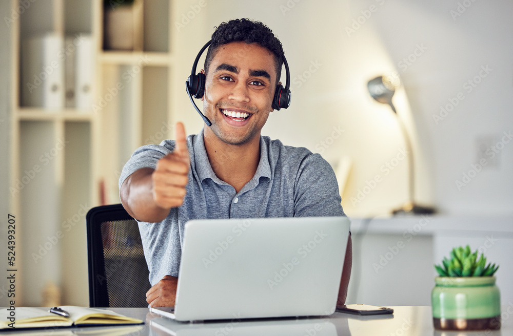 Thumbs up by call center, looking pleased and showing support with hand gesture while working on a l