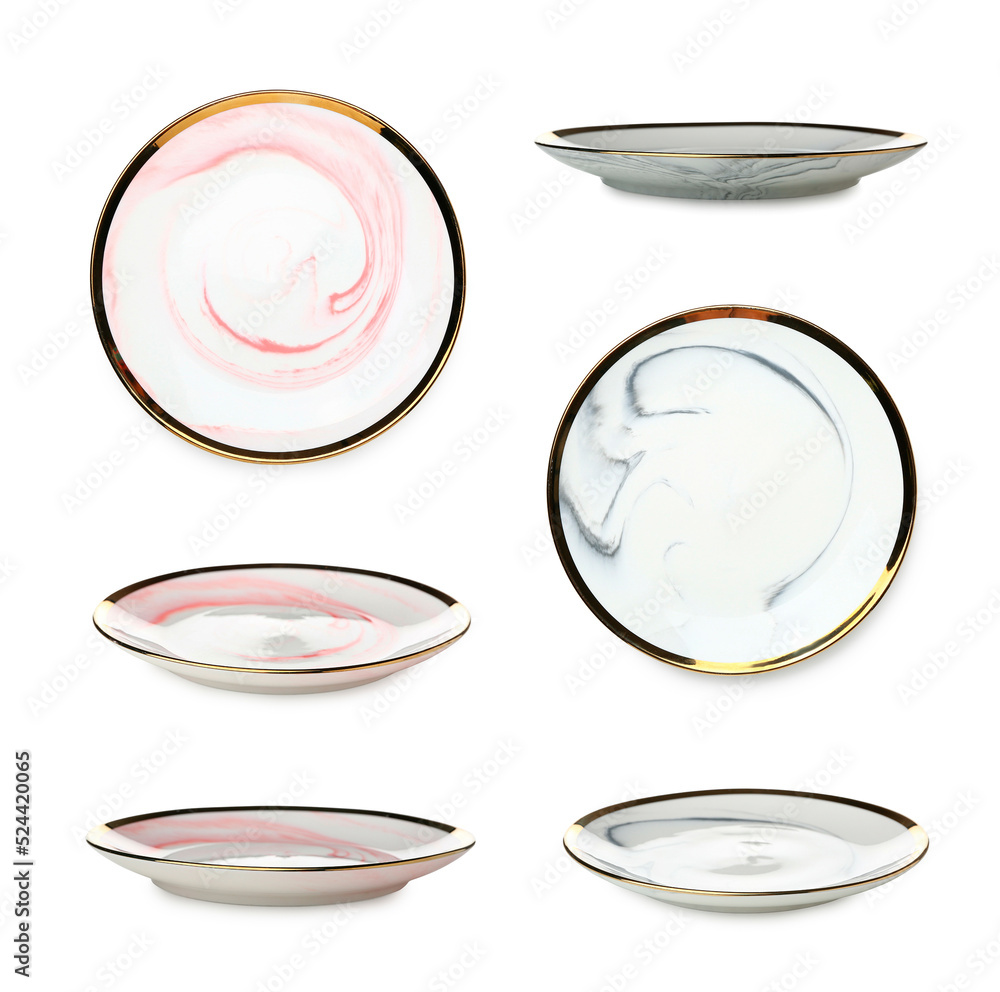 Set of empty ceramic plates isolated on white