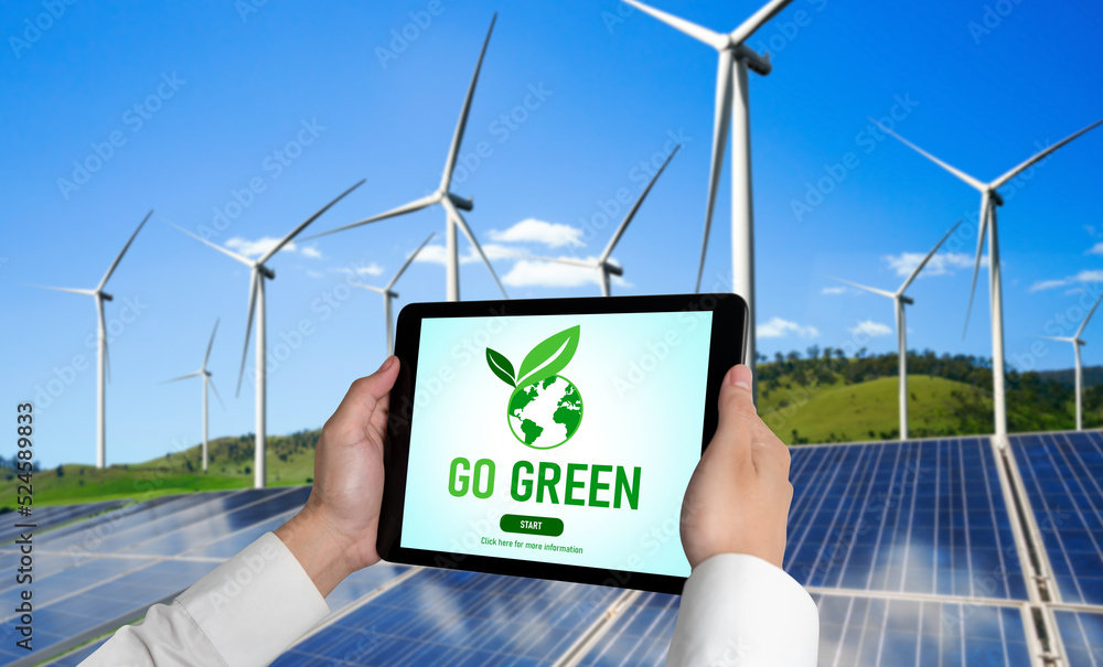 Green business transformation for environment saving and ESG business concept. Businessman using tab