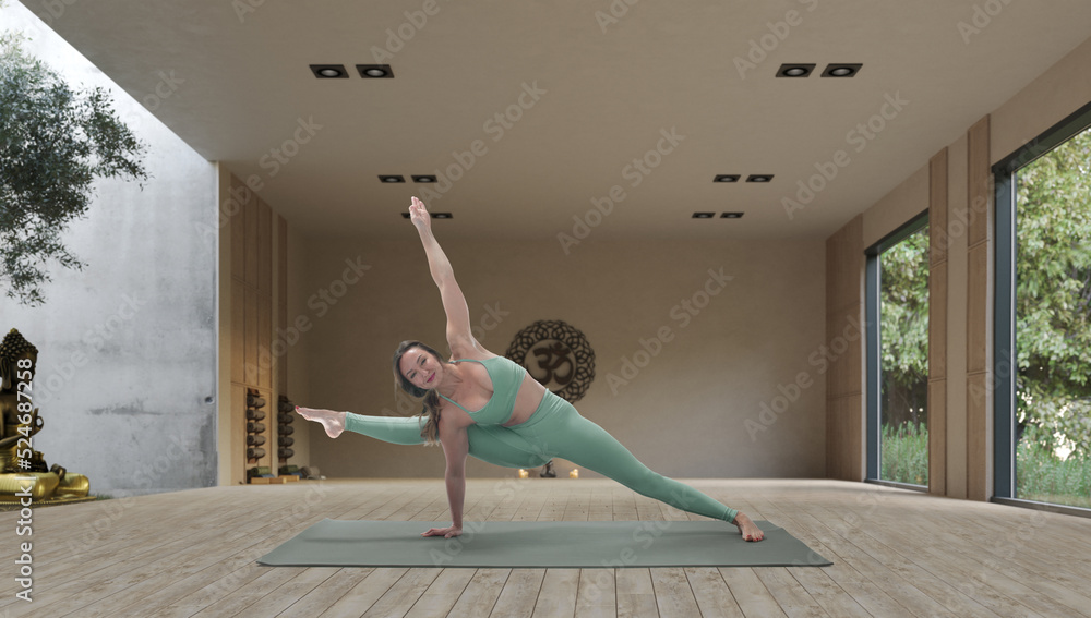 Young athletic attractive woman practicing yoga in a wooden yoga hall.