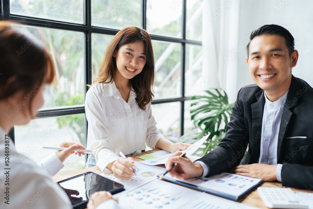 Group of asian young creative happy people entrepreneur on a business meeting office background Good