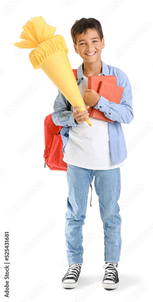 Little boy with yellow school cone and books on white background