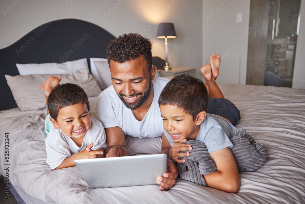 Technology, man and children relax on bed together to bond and have fun on the weekend with digital 