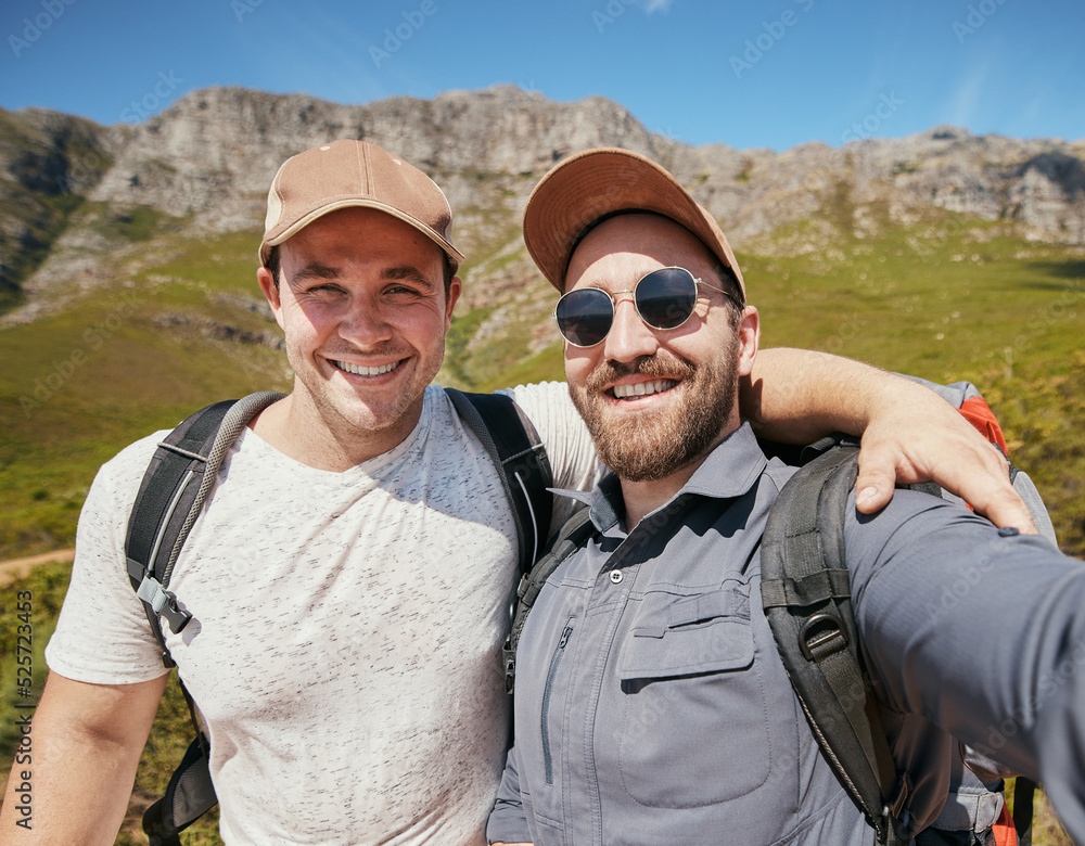 Selfie of happy hiking men or friends in mountains or nature on vacation holiday travel in summer or