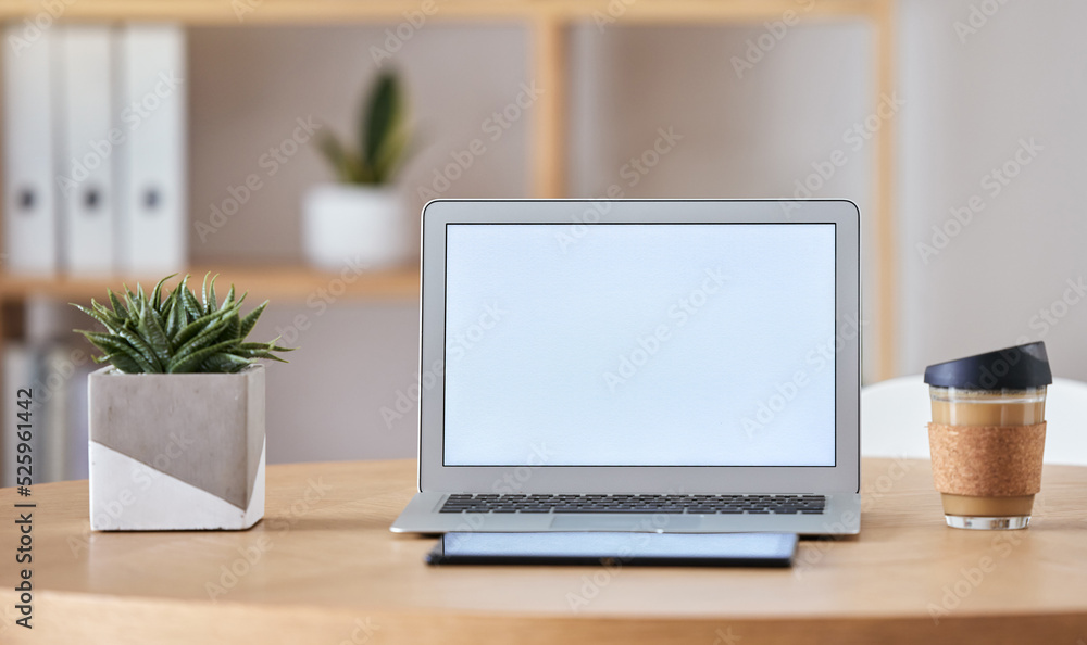 Mockup laptop, coffee and tablet on desk at home office of freelance SEO, UX or digital social media