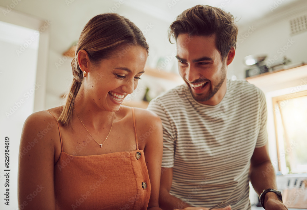 Happy laughing couple with smile bonding and having fun while having time together at home. Joke, in