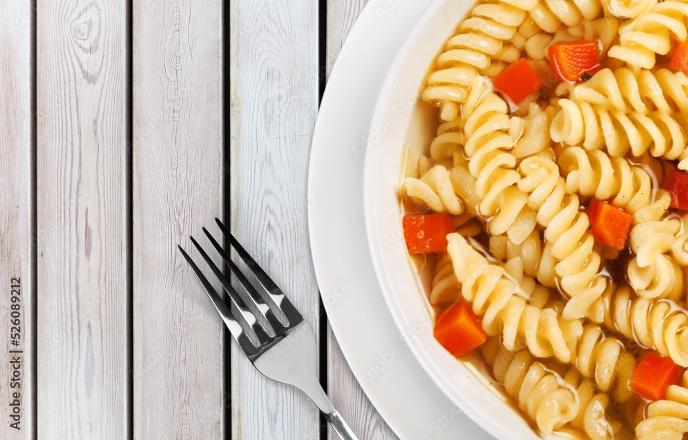 Italian Summer Salad with Pasta on plate. Fresh and healthy summer food