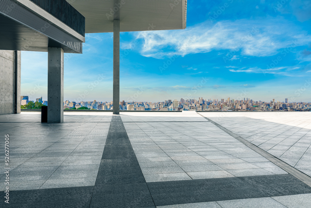 Empty square floor and city skyline with modern buildings scenery