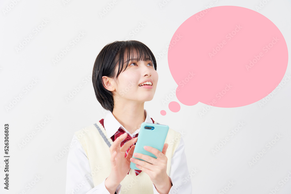 白背景でスマホを使う女子高生　吹き出しあり