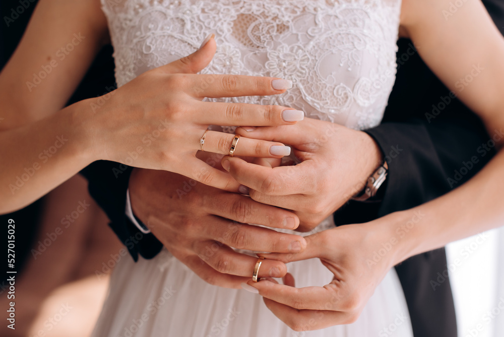 bride and groom holding hands