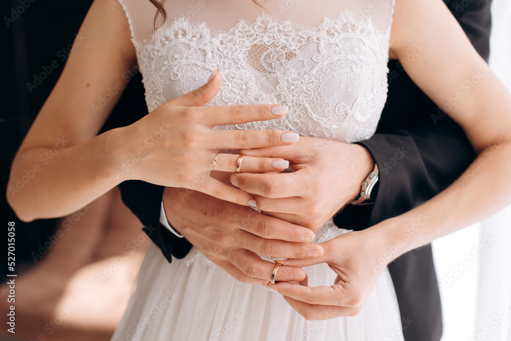 bride and groom hands