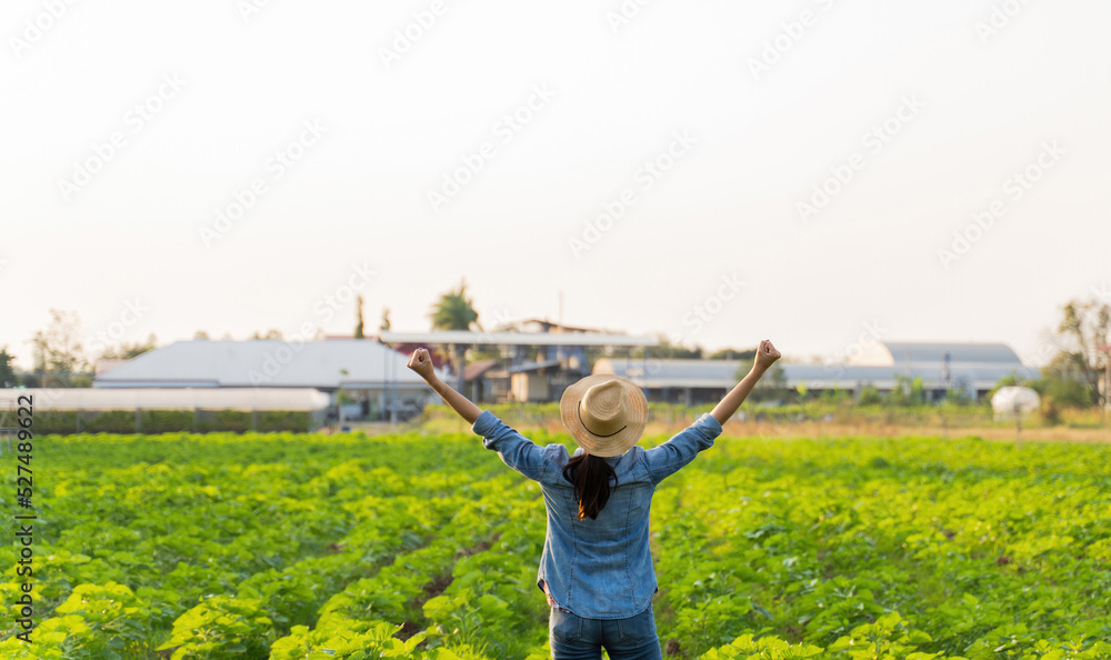 She is a happy female gardener.