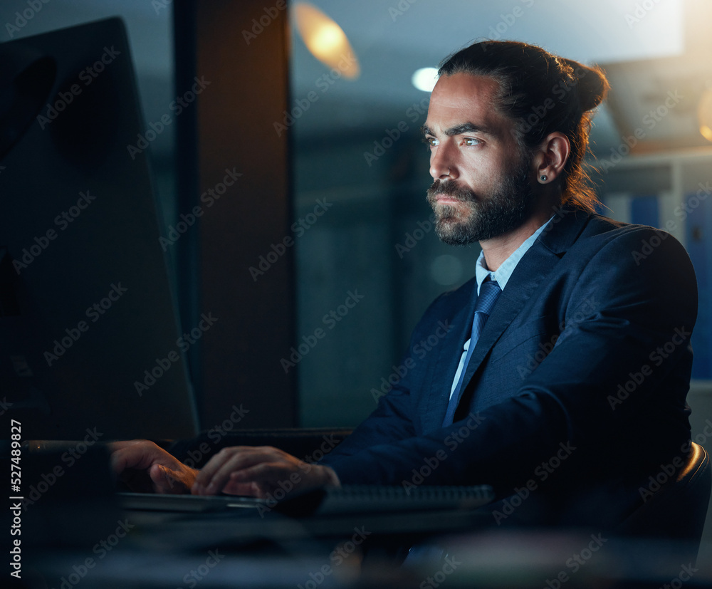 Business, office and night with a corporate employee working on a computer and the internet in a com