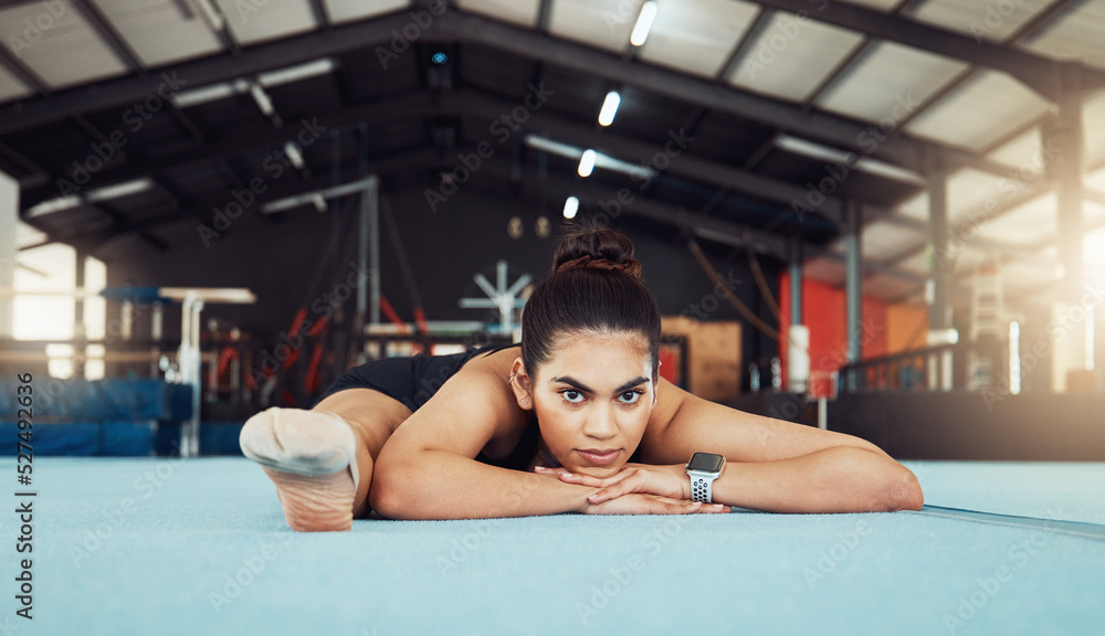 Woman stretching on floor at health gym, doing workout exercise at sports club and training for fitn