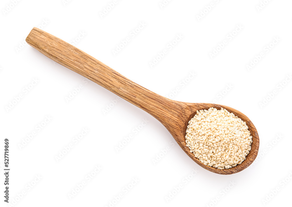 Wooden spoon with sesame seeds isolated on white background