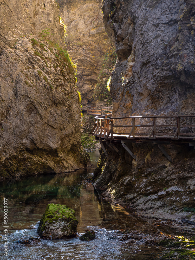 Amazing view of picturesque Vintgar canyon with flowing river and wooden trail