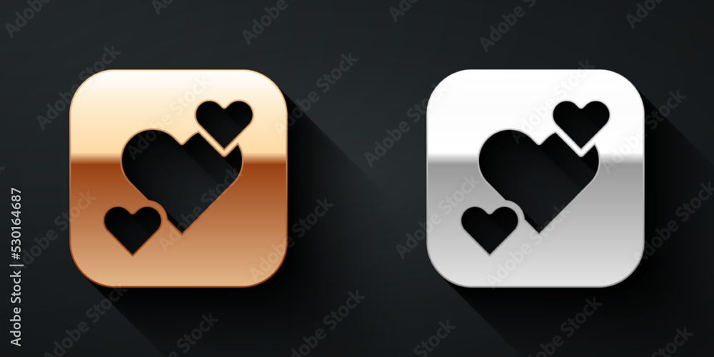 Gold and silver Heart icon isolated on black background. Romantic symbol linked, join, passion and w