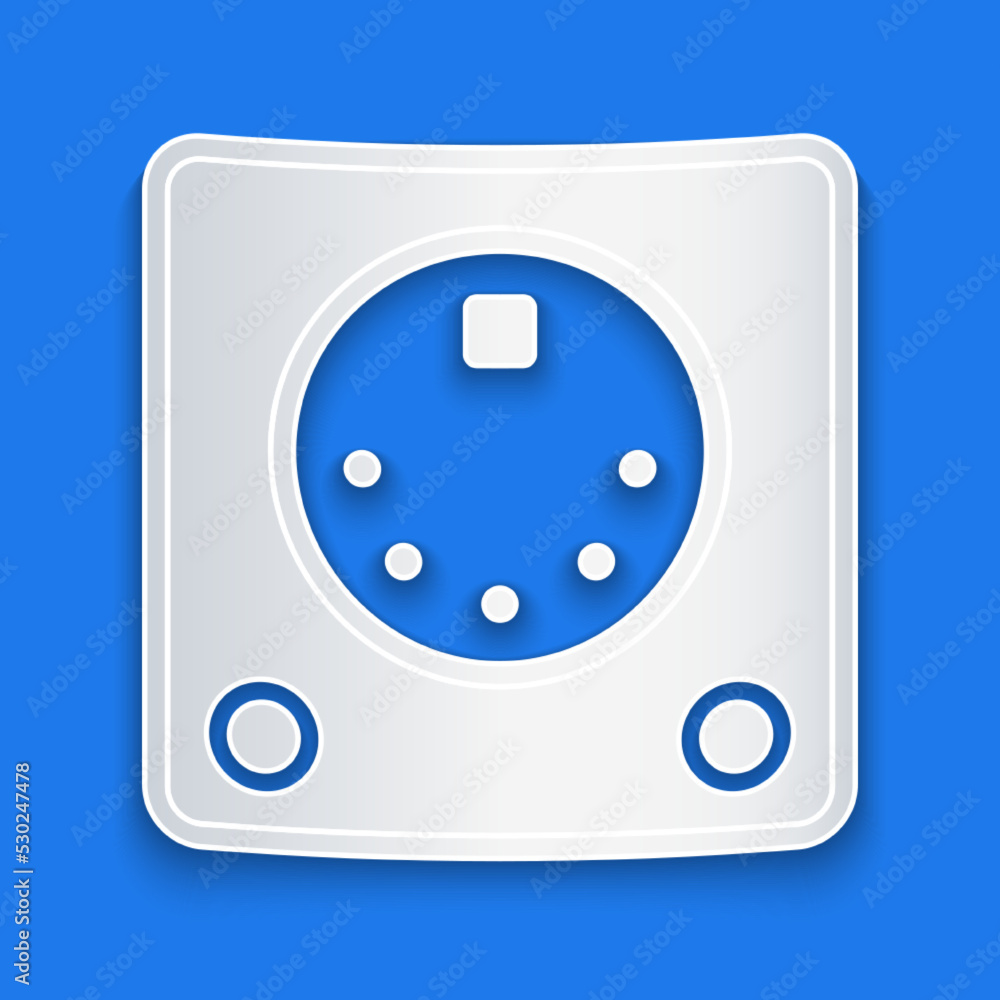 Paper cut Drum machine icon isolated on blue background. Musical equipment. Paper art style. Vector