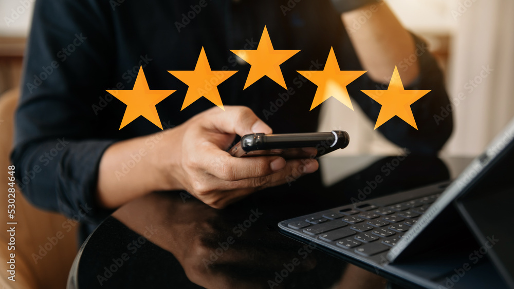 Customer or client the stars to complete five stars. with copy space. giving a three star rating. Se