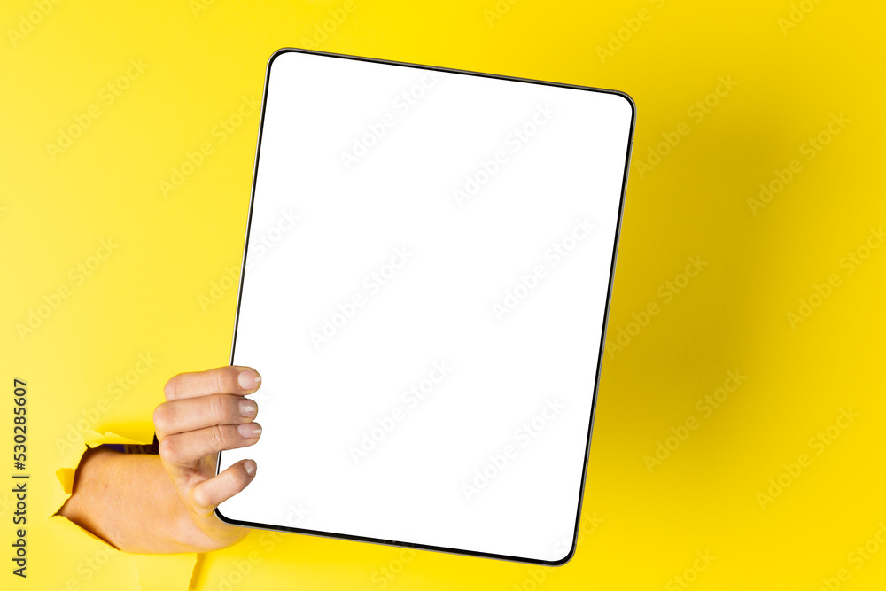 Composition of hand holding board with copy space on yellow background