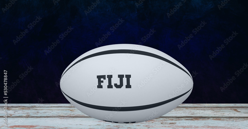 Composition of rugby ball decorated with text fiji on black background