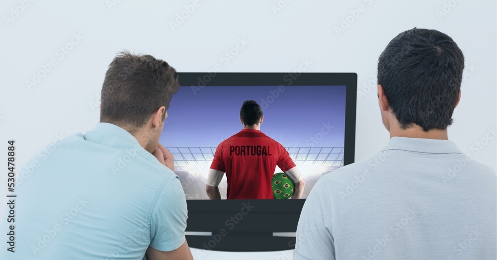 Composition of two male sports fans watching football match on tv