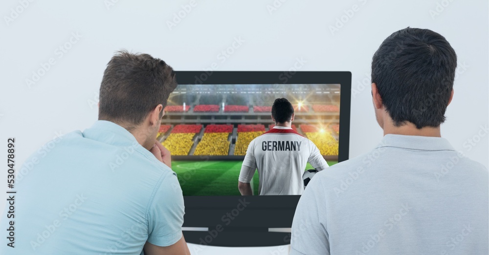 Composition of two male sports fans watching football match on tv