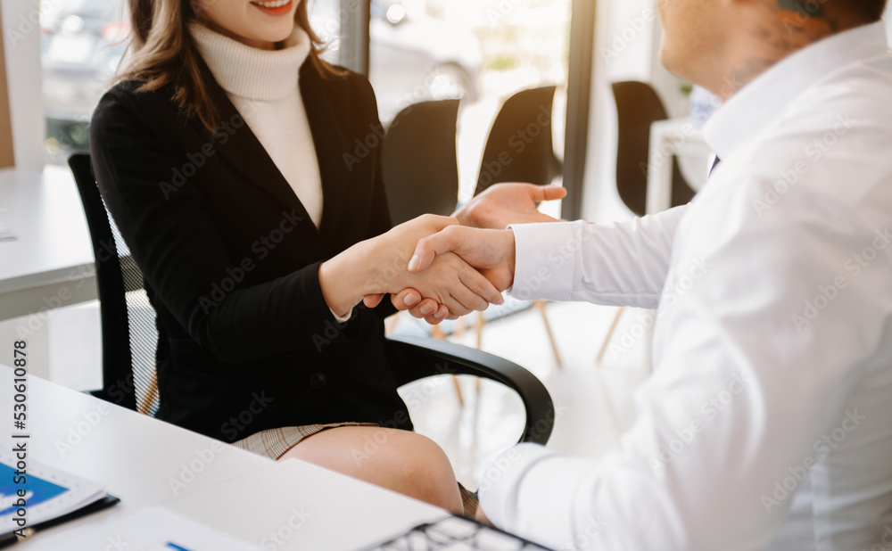 Teamwork business concept of group of three coworkers join hand together during their meeting..