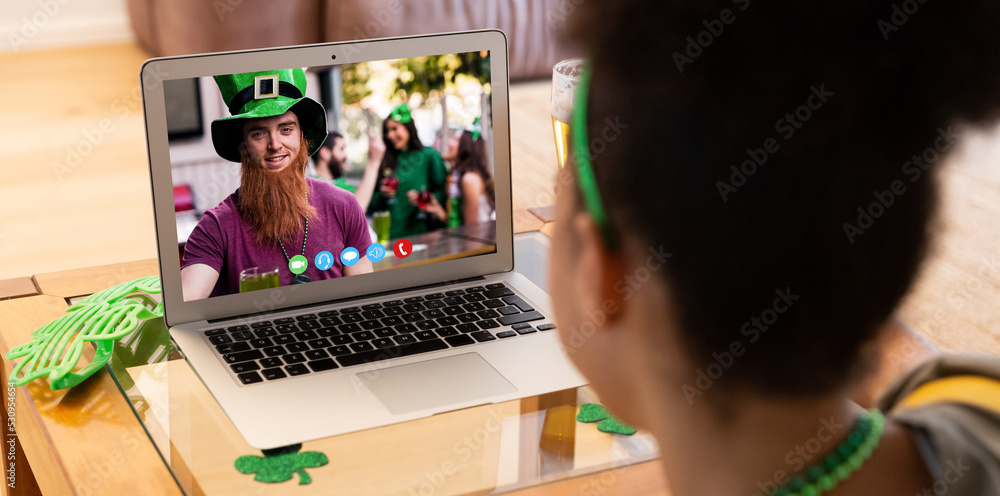 African american woman having a video call on laptop at home