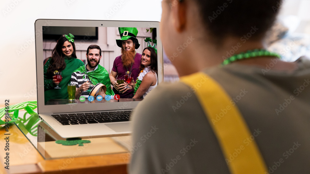 African american woman having a video call on laptop at home