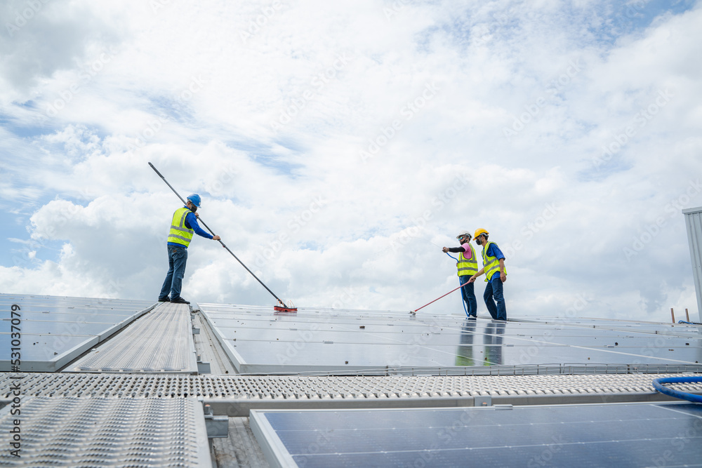 labor working on cleaning solar panel at solar power plant,Professional cleaning,Solar panels.