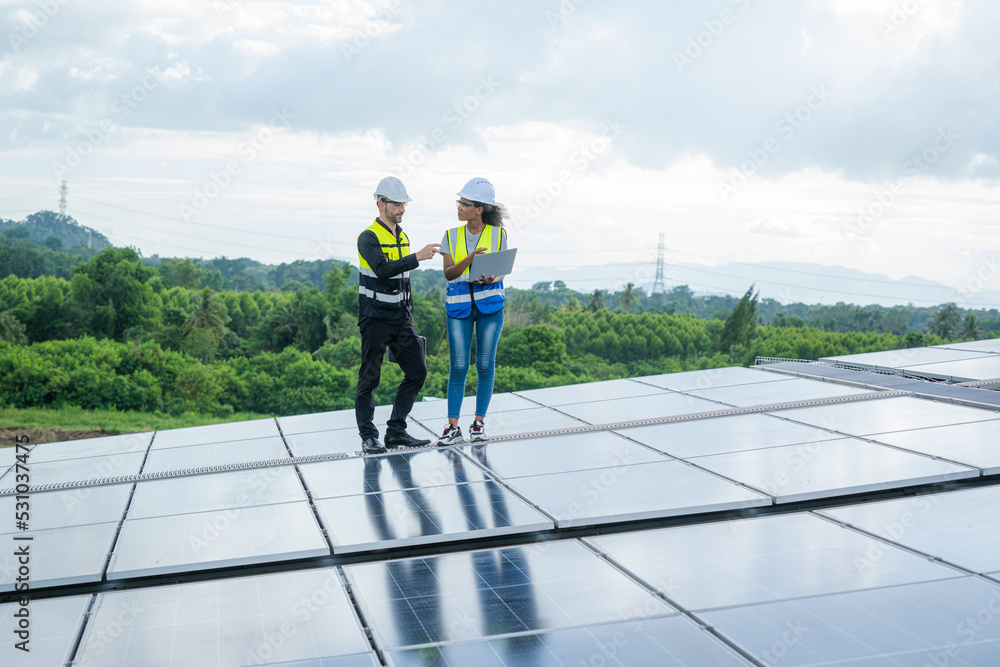 Technician inspection and repair solar cell on the roof of factory,Service check installation solar 