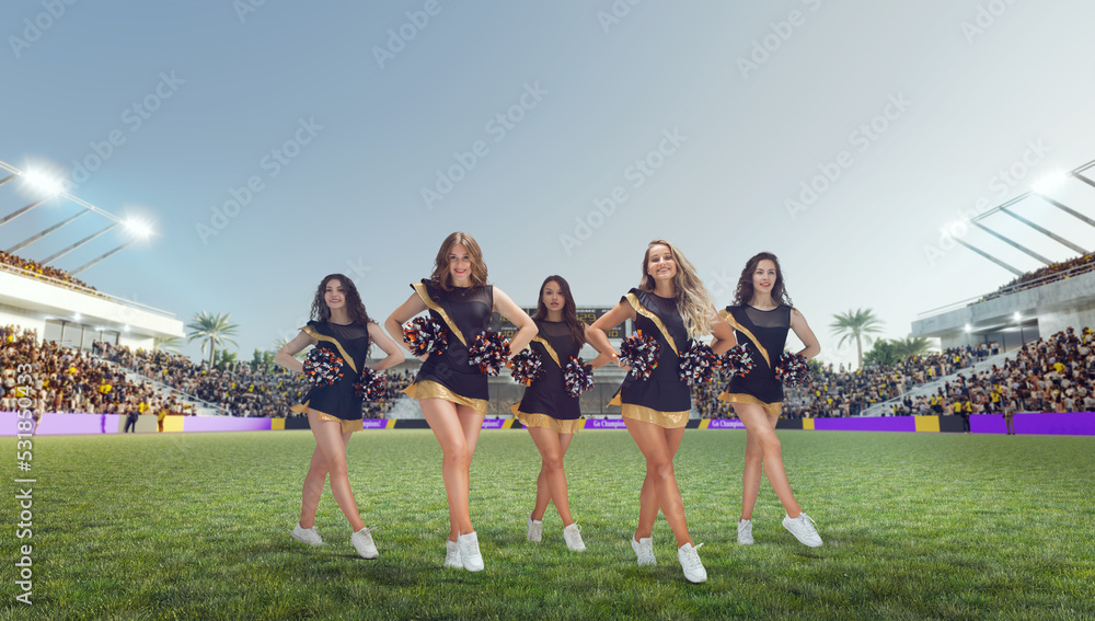 Group of cheerleaders in action on  stadium