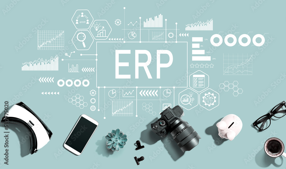 ERP - Enterprise resource planning theme with electronic gadgets and office supplies - flat lay