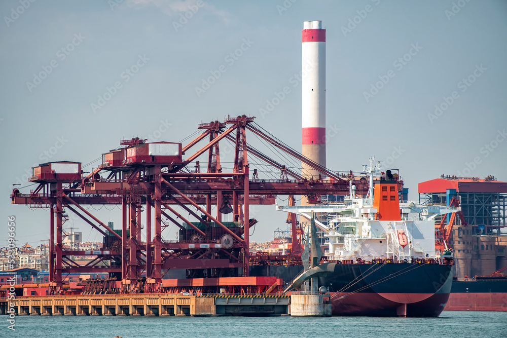 Dock cranes loading containers, trade port, shipping