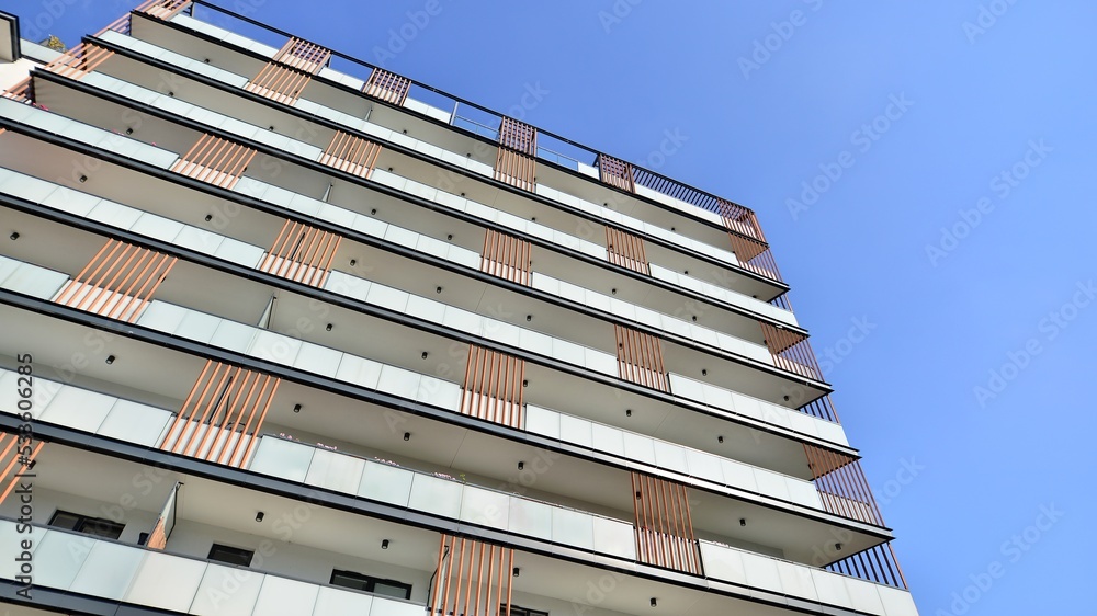 Modern luxury residential flat. Modern apartment building on a sunny day. Apartment building with a 